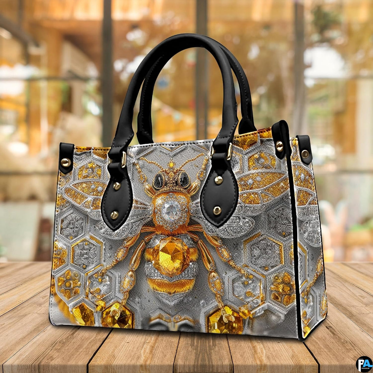 Top down view of bee handbag showing zipper closure and interior opening.