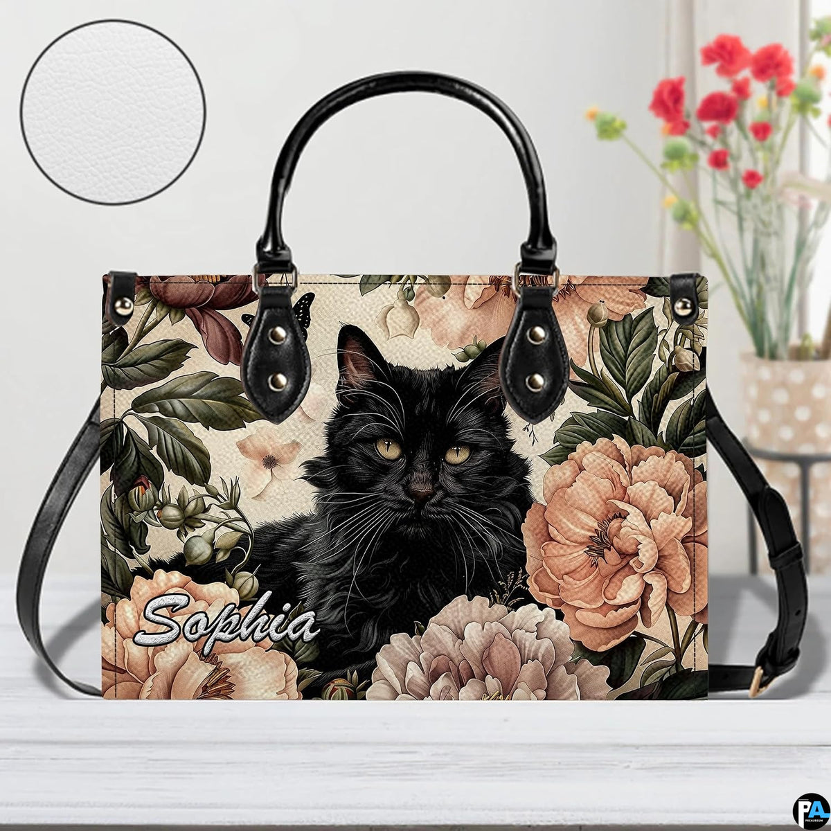 Companion accessory displaying fluffy black cat art placed on a white surface in a studio.