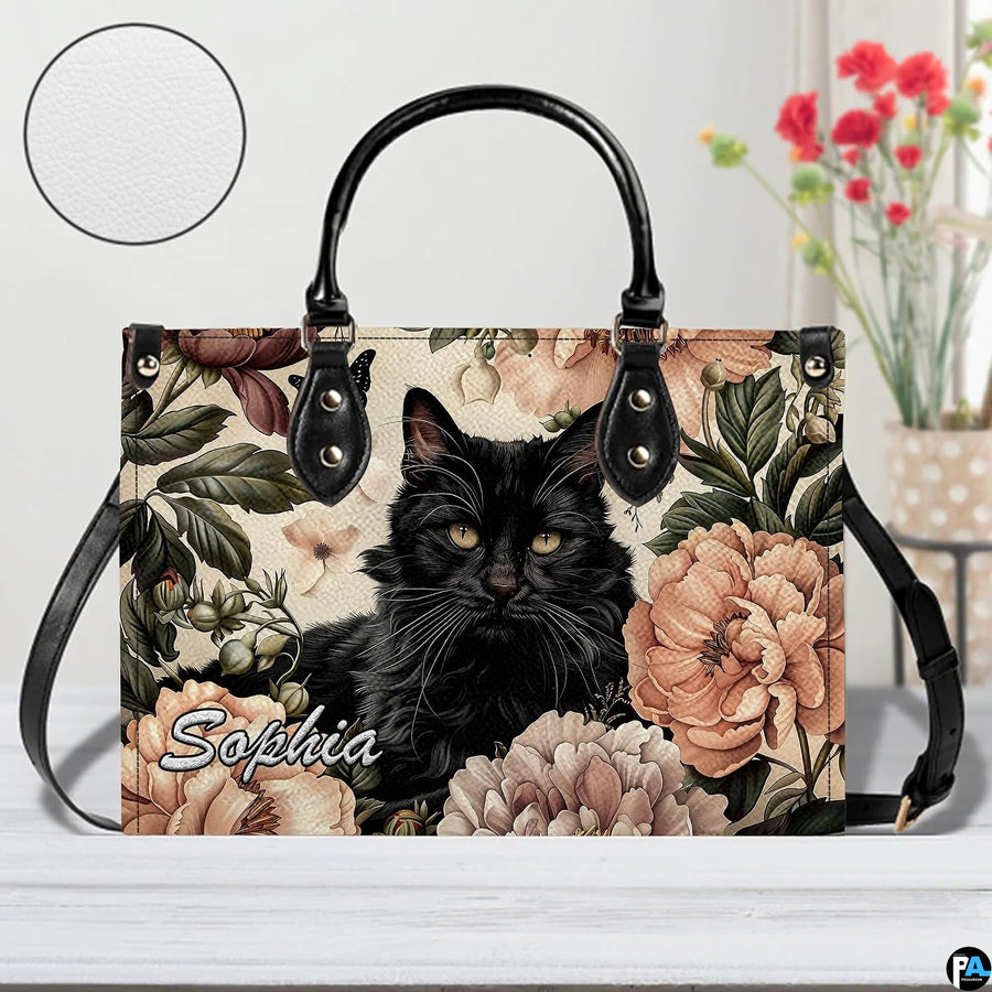 Companion accessory displaying fluffy black cat art placed on a white surface in a studio.