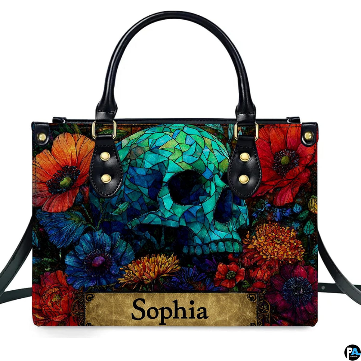 Stained glass mosaic skull handbag displayed alone on white studio background.