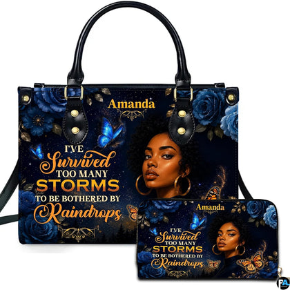 Resilience portrait handbag with blue roses, glowing butterflies, and matching wallet.