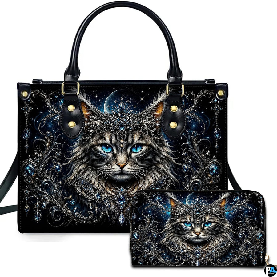 Studio photo showing crowned cat artwork alongside matching companion accessory on plain white surface.