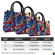 Side perspective view of patriotic floral handbag and wallet