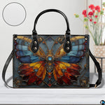 Front view of matching stained glass butterfly zip wallet showcasing leaded filigree artwork