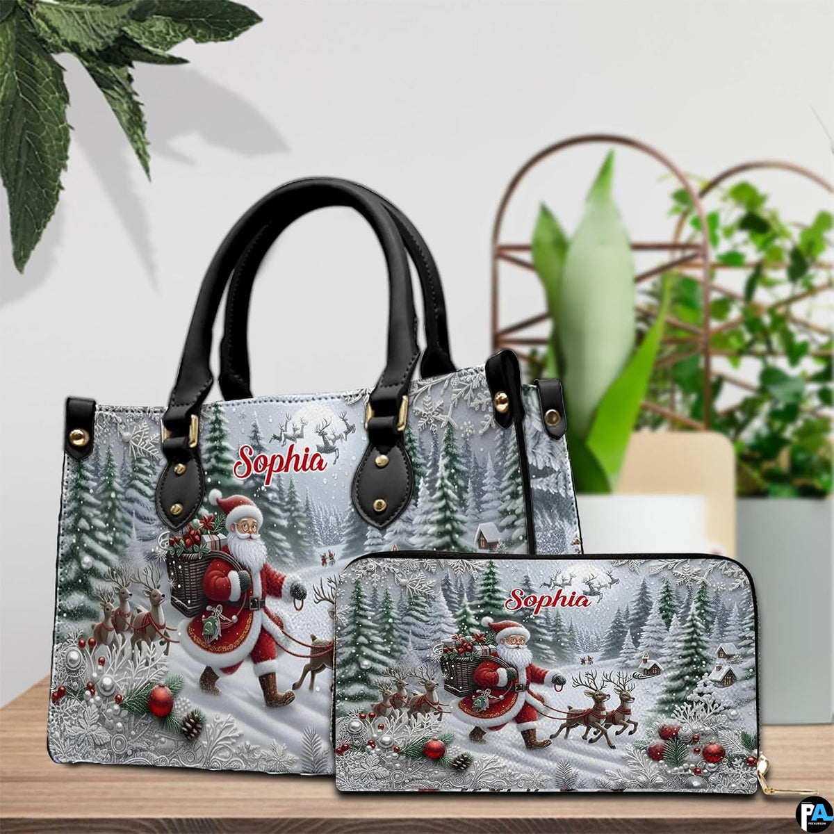 Coordinated handbag and matching zip wallet arranged together on a tabletop beside greenery.