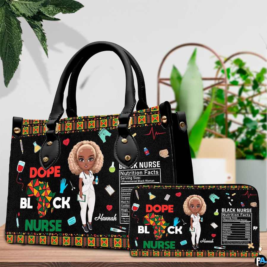 Melanin nurse handbag and matching wallet set displayed on wooden tabletop beside greenery.