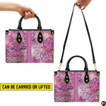 Matching zip wallet featuring coordinated pink lilies, wooden cross, and pastel cloud backdrop.