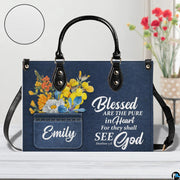 Side perspective view of scripture denim accessory on plain studio background