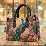 Turquoise peacock handbag framed by pink, coral and peach flowers