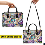 Angled display of opalescent mosaic purse paired with coordinating zippered companion wallet.