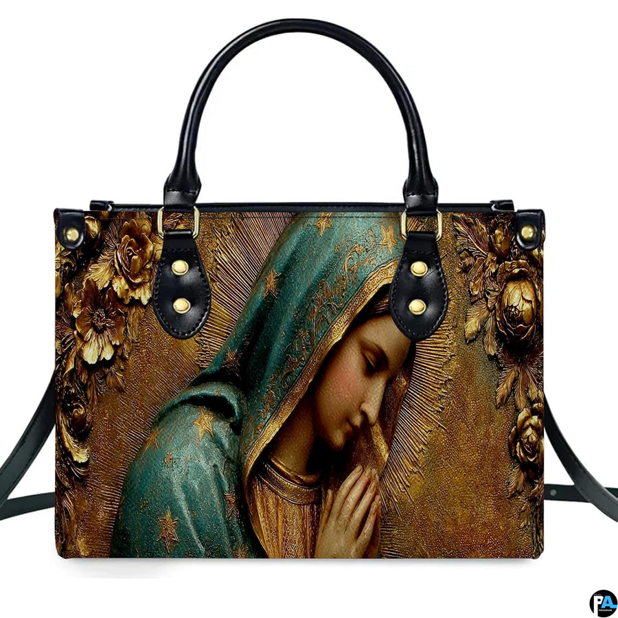 Close-up view of intricate golden bas-relief floral carving and star-adorned turquoise veil