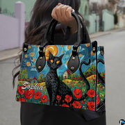 Outdoor lifestyle view showcasing van gogh style cat painting design on elegant accessory.