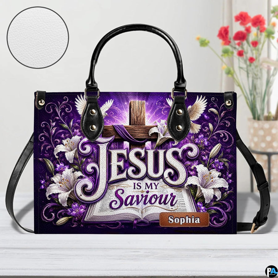 Tabletop perspective of the purple devotional cross handbag with circular material texture swatch inset.