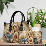 Matching Immaculate Heart handbag and wallet set in botanical lifestyle display