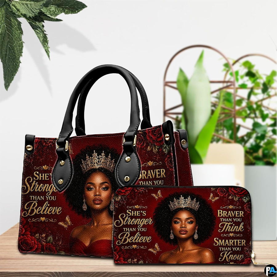 Tabletop presentation showing the crowned empress artwork and coordinating accessory near potted plants.