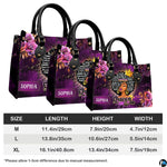 Side perspective view of twin star afro queen handbag and wallet showing structured profile