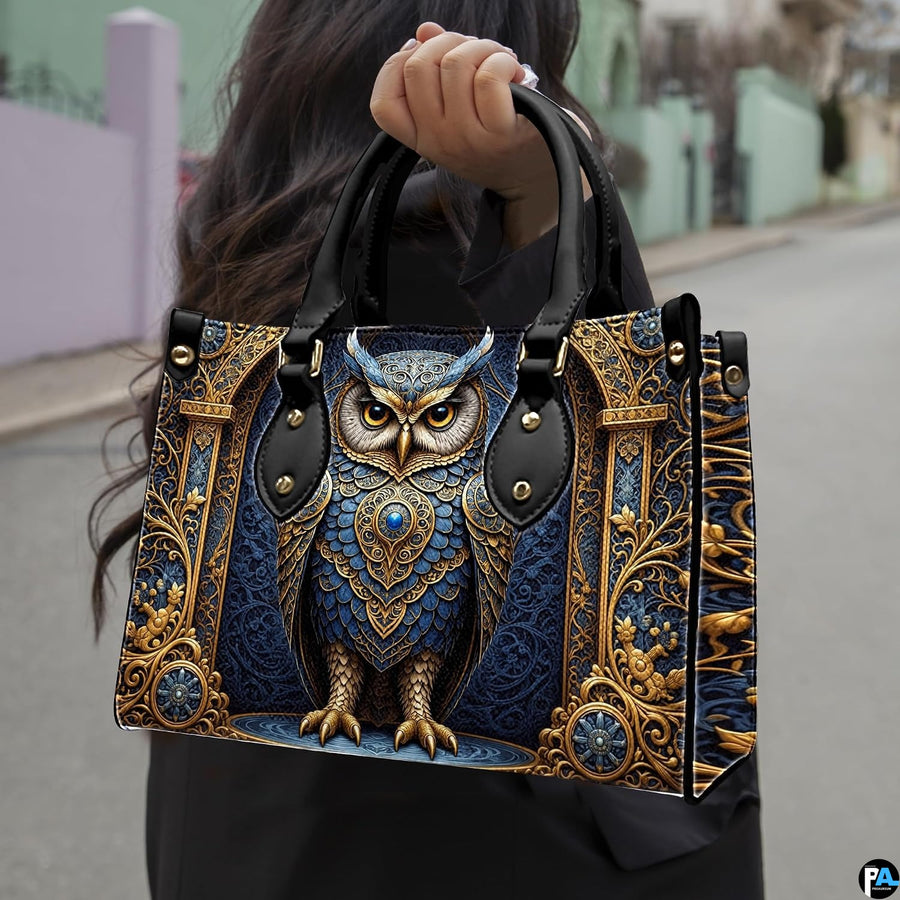 Matching zip-around wallet featuring baroque gilded owl and classical architectural archway