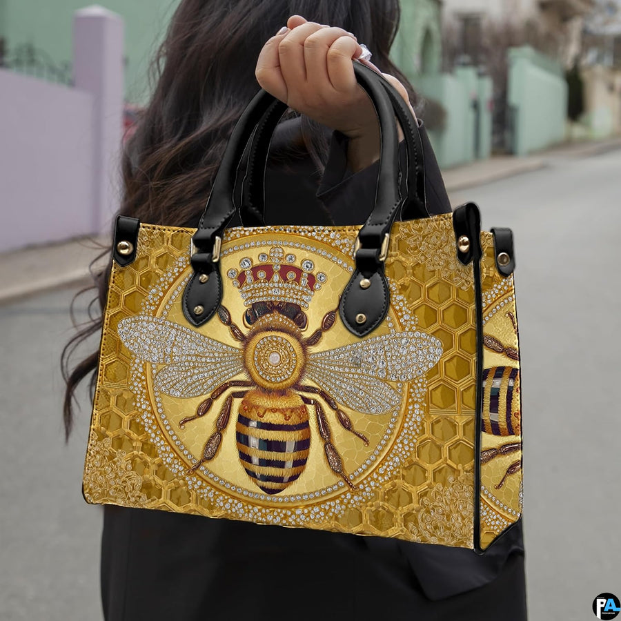 Front view of crowned honey bee handbag showing ornate imperial bee graphic.