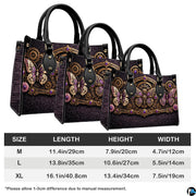 Side profile of clockwork butterfly handbag showing dark aubergine damask pattern