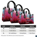 Angled display highlighting the vivid pink flamingo illustration and paint drip details.
