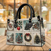 Street perspective of the holiday stamp collage shoulder bag.