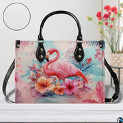 Street perspective of the colorful botanical flamingo shoulder bag.