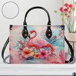 Street perspective of the colorful botanical flamingo shoulder bag.