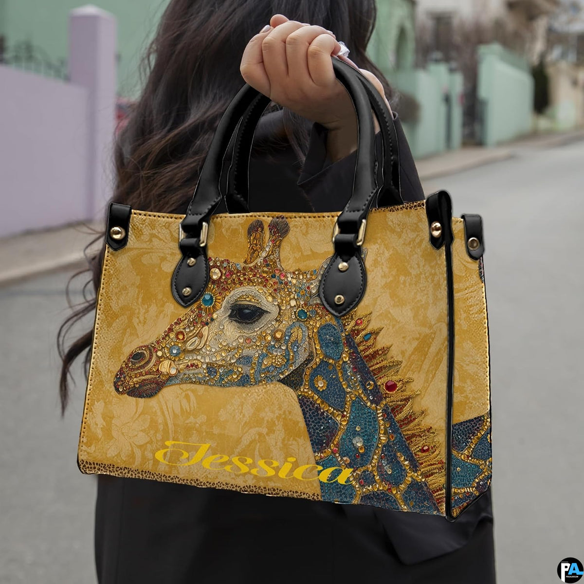 Side profile of ornate giraffe handbag showing structured silhouette and black carrying handles.