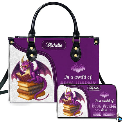 Front view of purple book dragon handbag and companion wallet featuring reading dragon artwork.