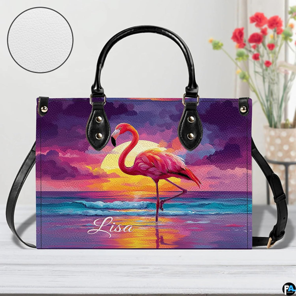 Street perspective of the colorful sunset flamingo shoulder bag.