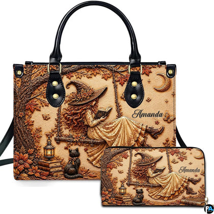 Autumn witch tree swing handbag displayed beside matching companion wallet.