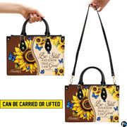 Dimensions diagram displaying sizing specifications for sunflower handbag and matching wallet.