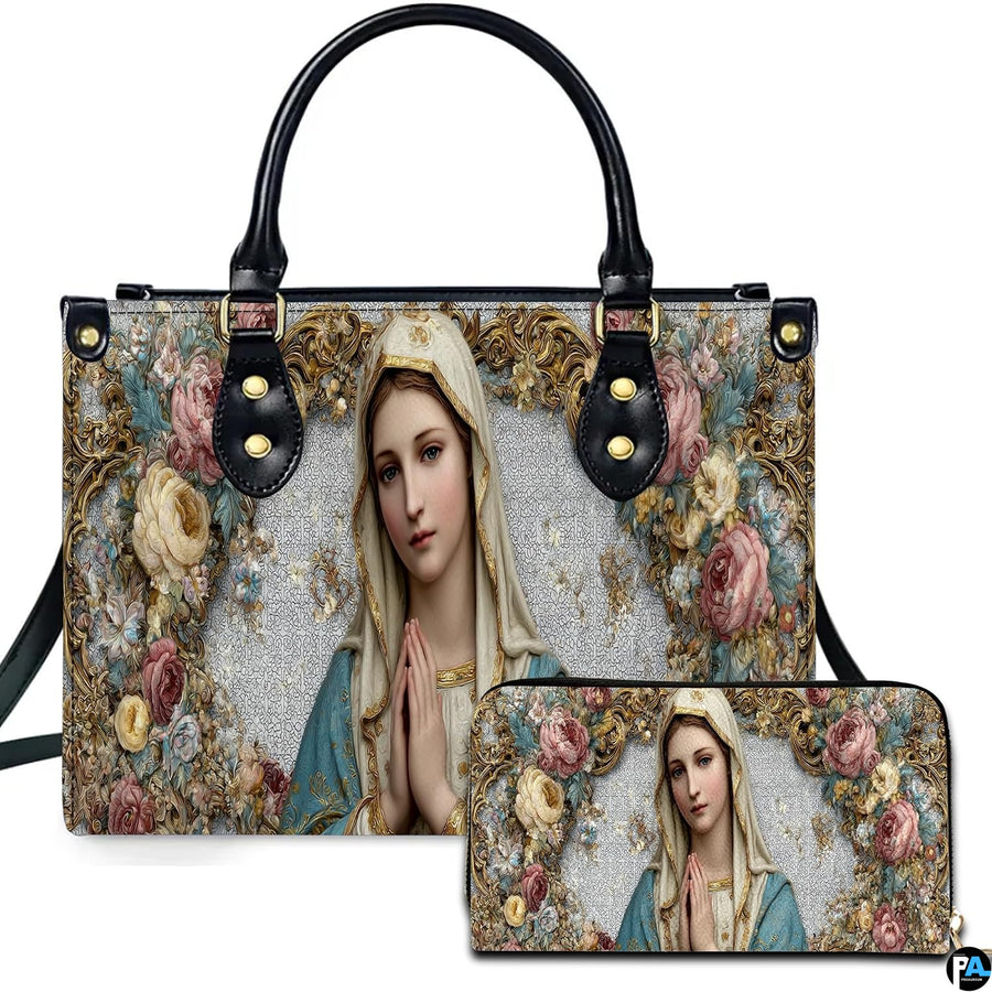 Front view of religious handbag featuring praying Virgin Mary in hooded ivory veil with gilded floral garland