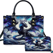 Cosmic shadow dragon handbag and matching zip wallet set featuring black winged dragon on starry nebula mist.