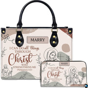 Christian Jesus line art handbag and matching wallet set on white background.