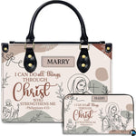 Christian Jesus line art handbag and matching wallet set on white background.
