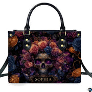 Gothic cosmic skull flower crown handbag displayed alone on white studio background.