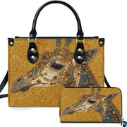 Front view of amber damask giraffe handbag and matching wallet set with ornate animal artwork.