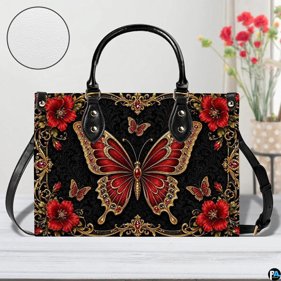 Tabletop presentation of baroque red butterfly artwork positioned beside floral vase and circular texture inset.