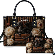 Gothic black dragon and white peony handbag and wallet set displayed against a white studio backdrop