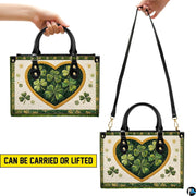 Clover heart handbag shown in handheld and shoulder presentations