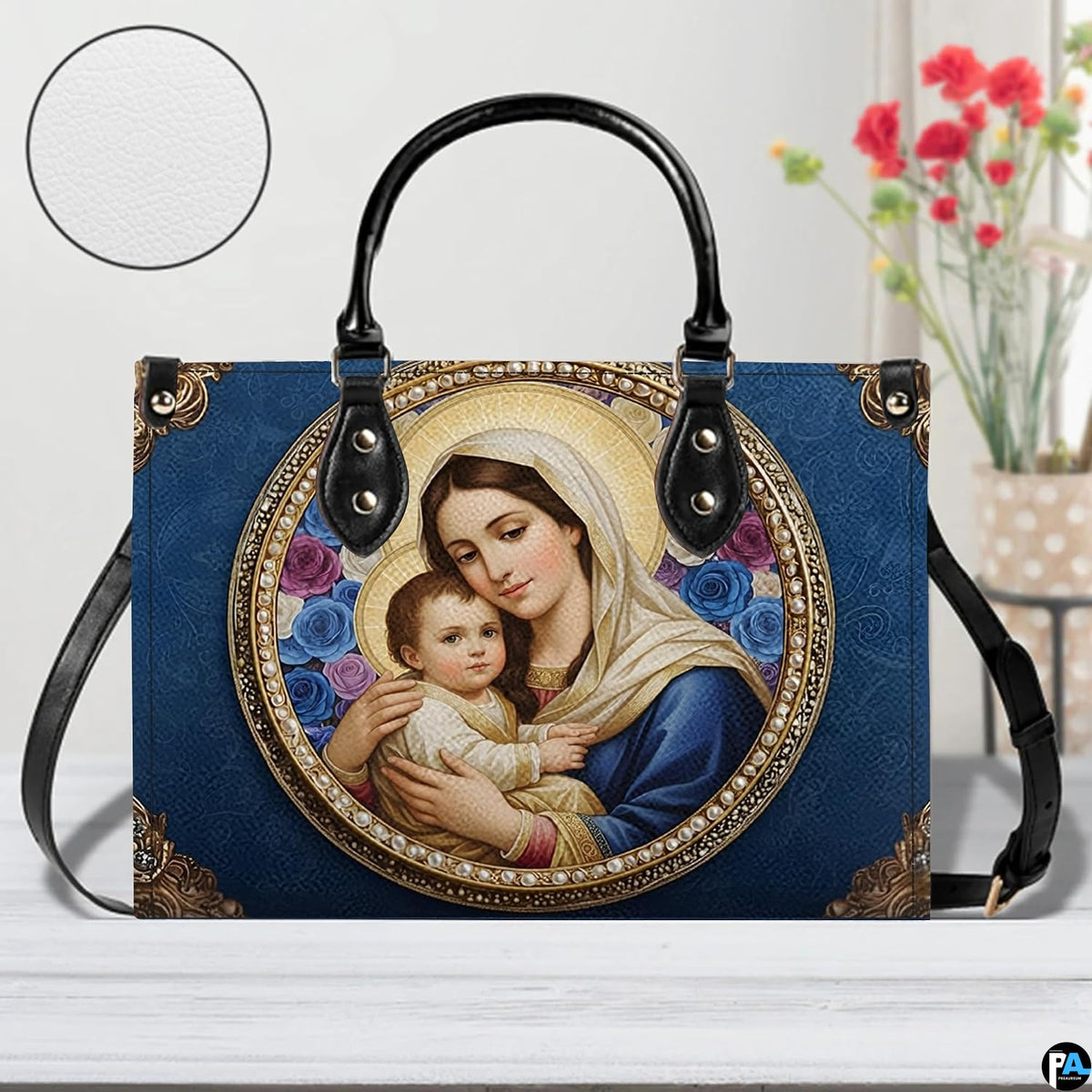 Side profile view of sapphire blue damask sacred art handbag
