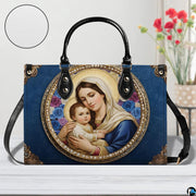 Side profile view of sapphire blue damask sacred art handbag