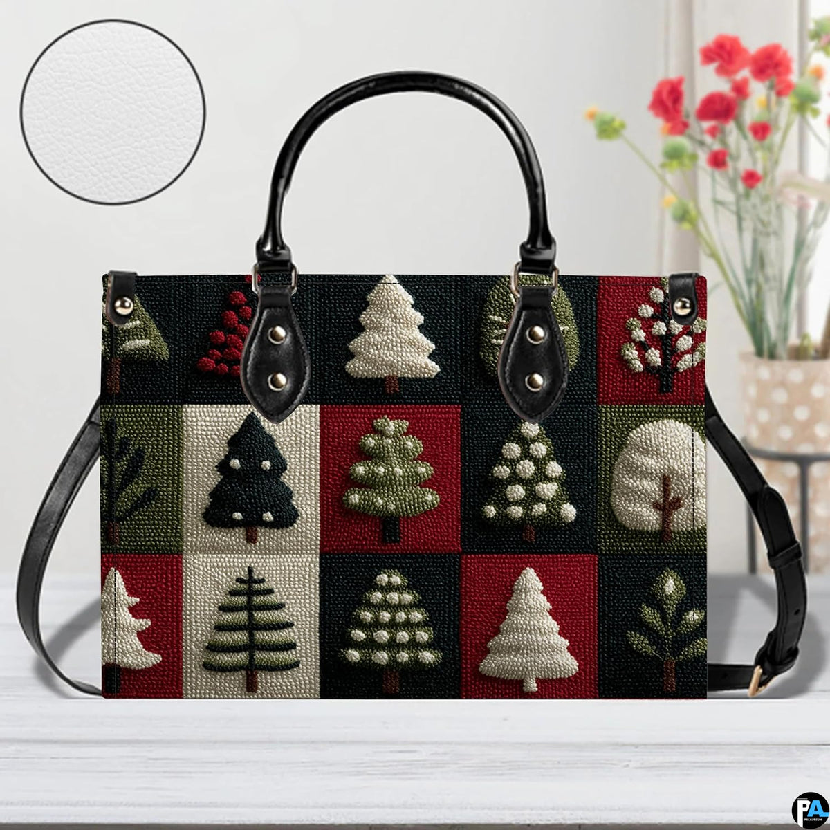 Sunlit tabletop view of winter pine patchwork pattern item with circular pattern inset