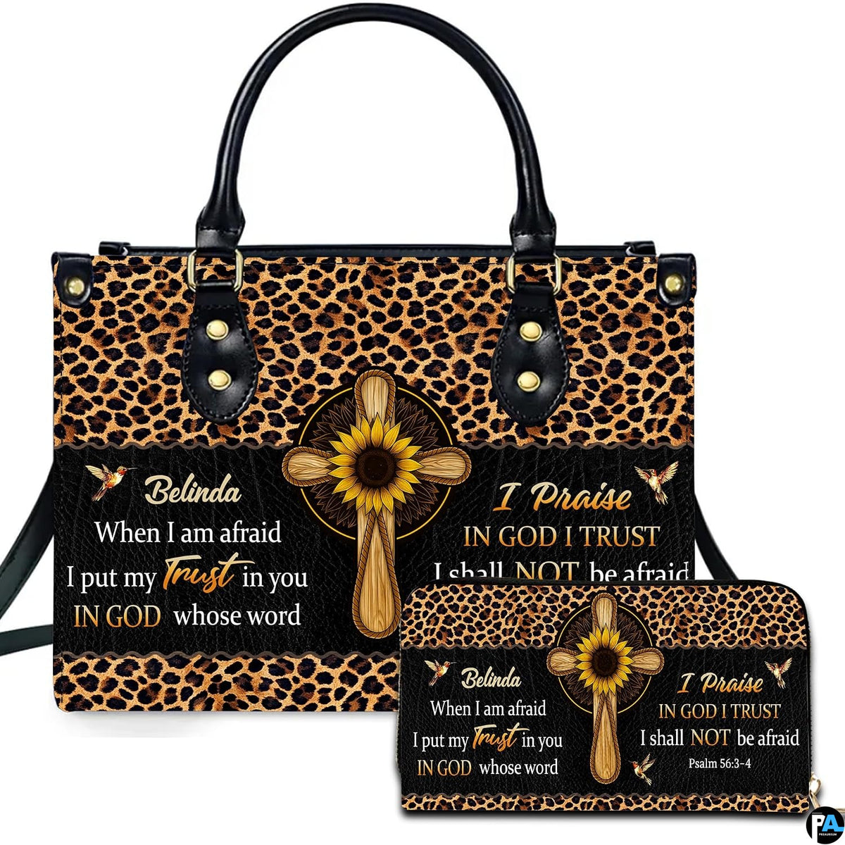 Front view of leopard and sunflower cross handbag and matching wallet with wooden cross centerpiece and hummingbirds.