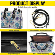 Detailed view of butterfly handbag interior showing zip pocket and inner structure.