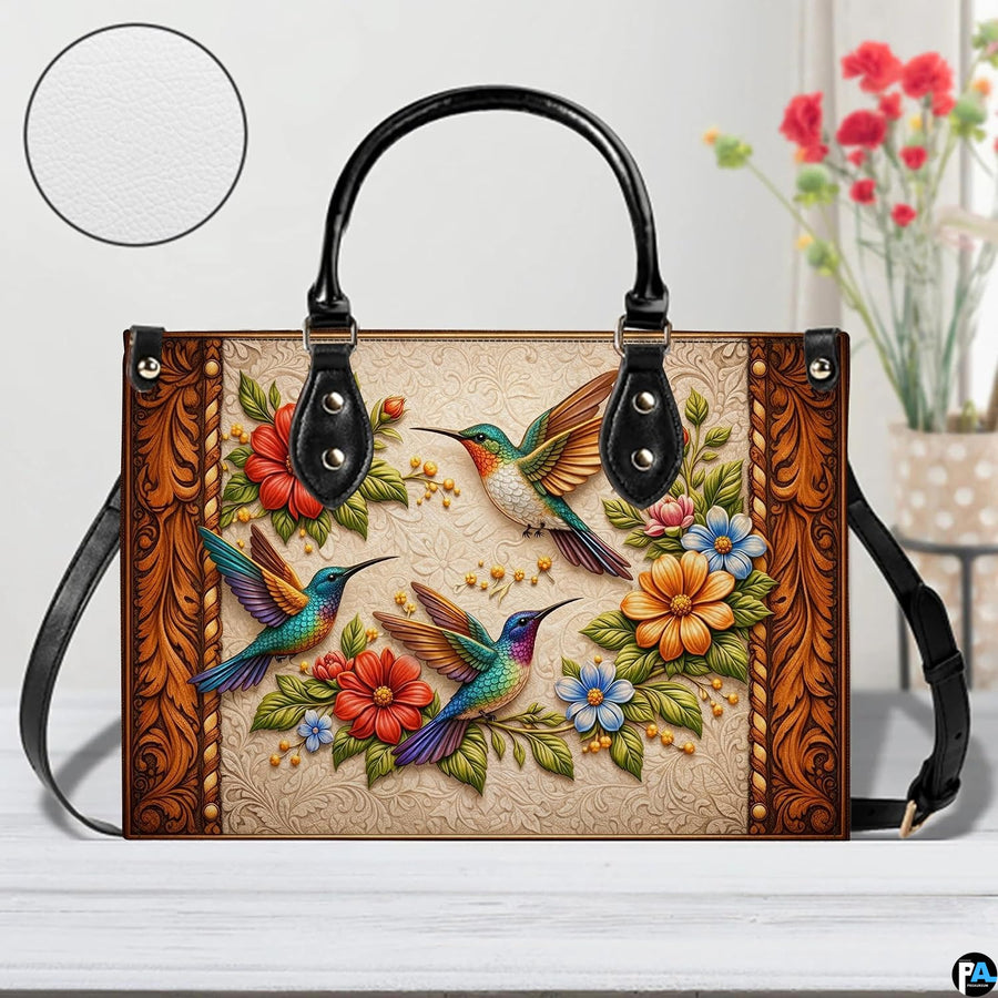 Front view of handbag resting on light surface with floral background and circular texture inset.