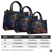 Top-down view of steampunk dragonfly handbag displaying top zipper opening