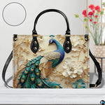 Front view of peacock floral design handbag with long strap