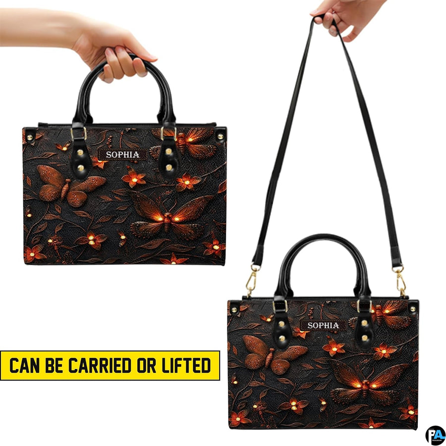 Carrying options demonstration illustrating handheld and shoulder wear for the firefly handbag.